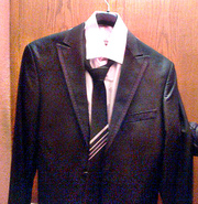 Продам мужской костюм черный,  новый, +рубашка, запонки, галстук.