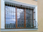 Защитные решетки на окна и двери,  изготовление и монтаж